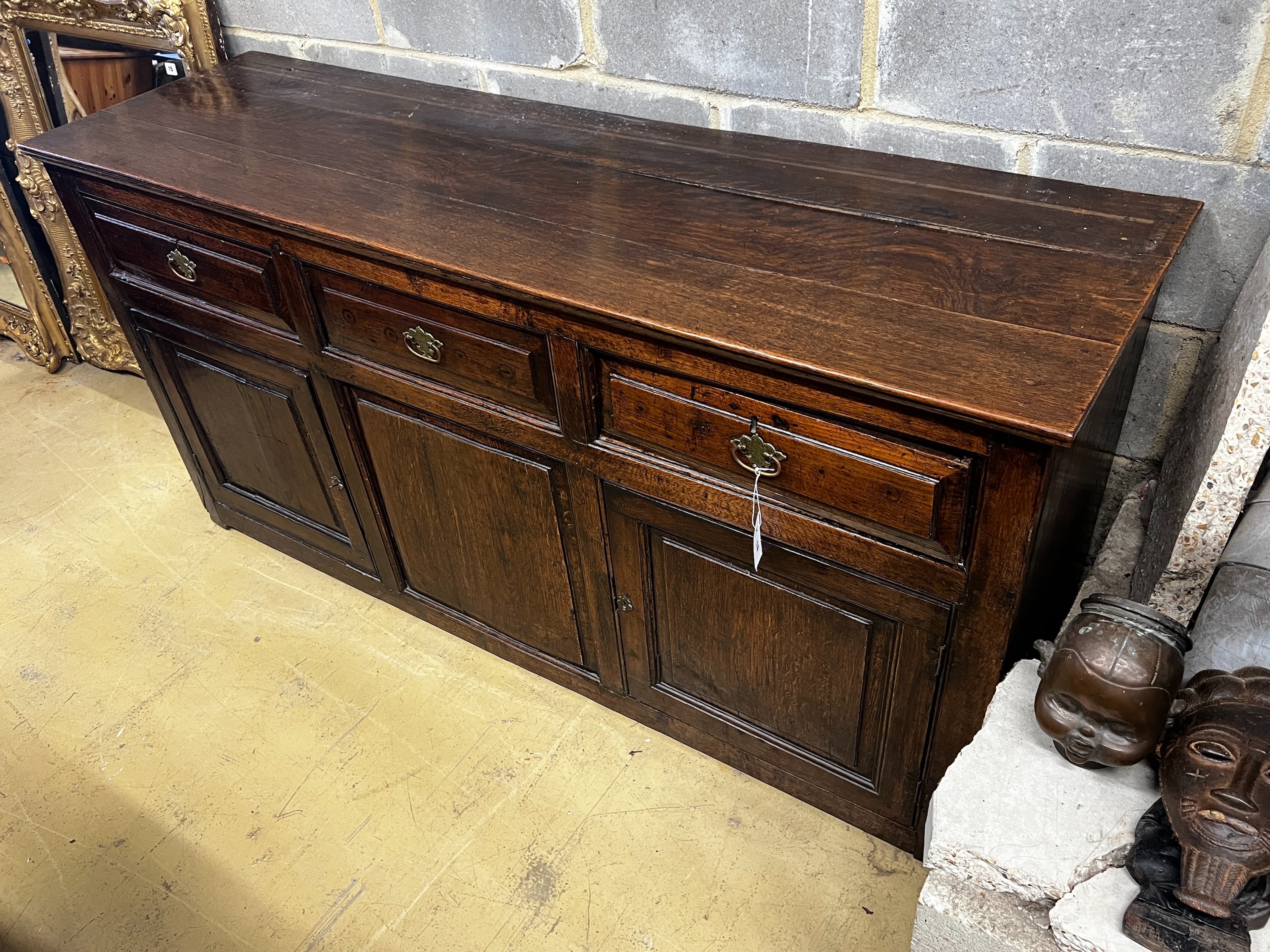 An oak low dresser, width 175cm, depth 50cm, height 88cm